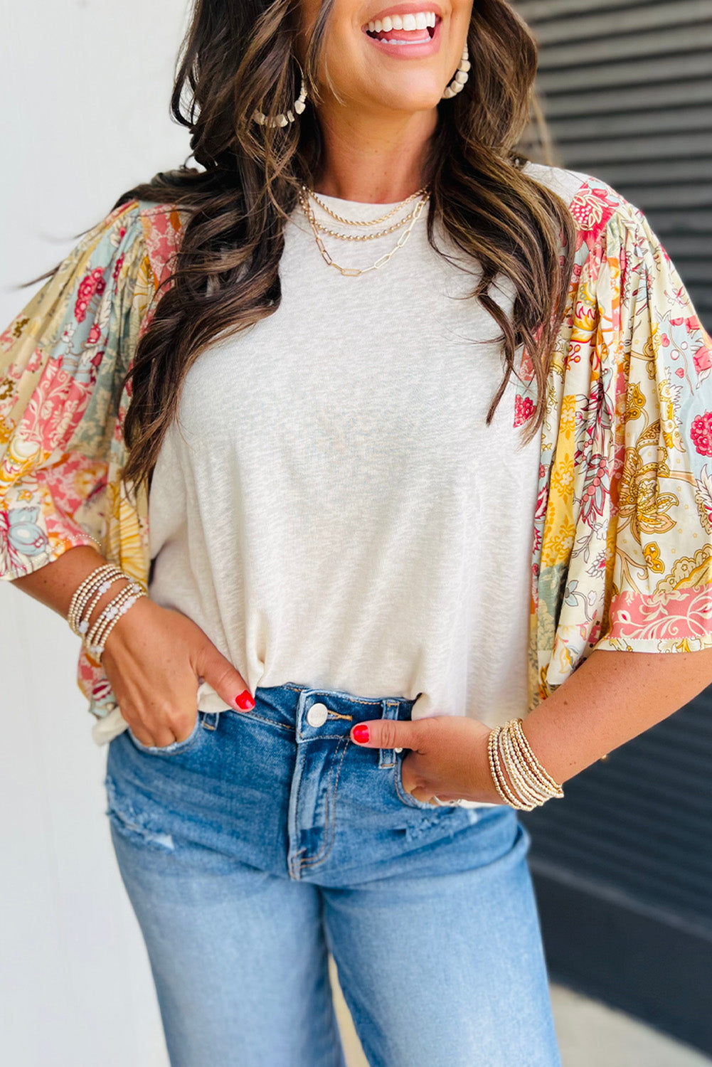 Blouse beige en patchwork floral à manches chauve-souris