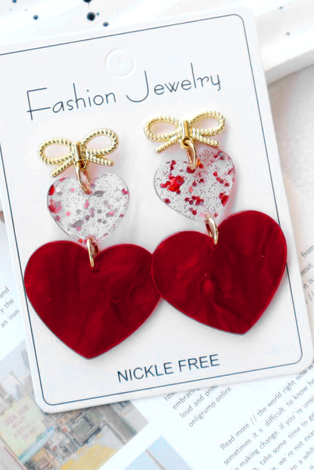 Boucles d'oreilles de Saint-Valentin en forme de nœud papillon et de cœur rouge ardent