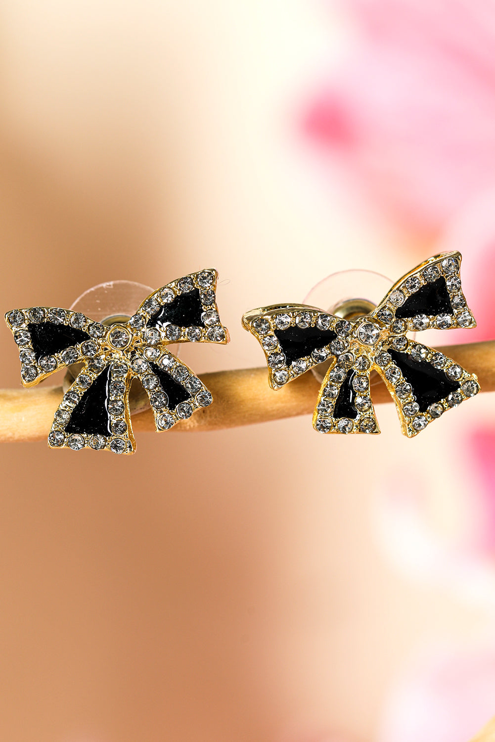 Boucles d'oreilles à tige en forme de nœud papillon avec strass noirs